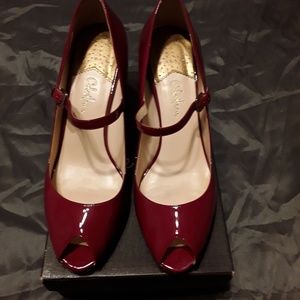 Red patent pumps
